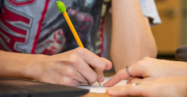 student writing blog