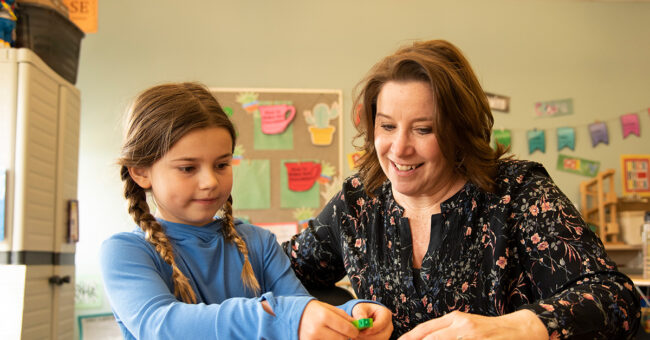 teacher with student