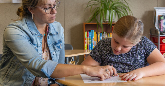 Teacher-and-student-in-classroom